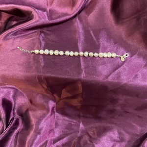 White natural pearl bracelet with classic hook closure. Worn once. Beautiful.